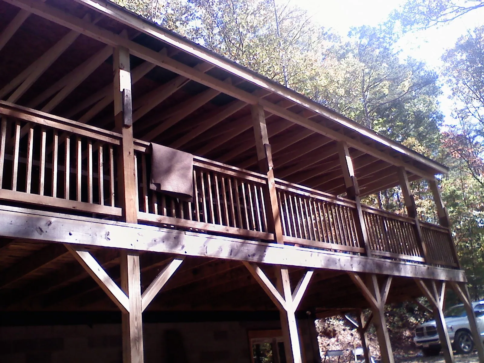 Timber framing under a new elevated porch and deck — Roof Leak Repair in Waldo by Roofing Brothers